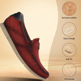 Red leather slip-on casual shoes by bugatti, with dark trim and perforated sides.