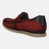 Red premium leather slip-on shoe by bugatti, with a dark leather heel cap and tan sole.