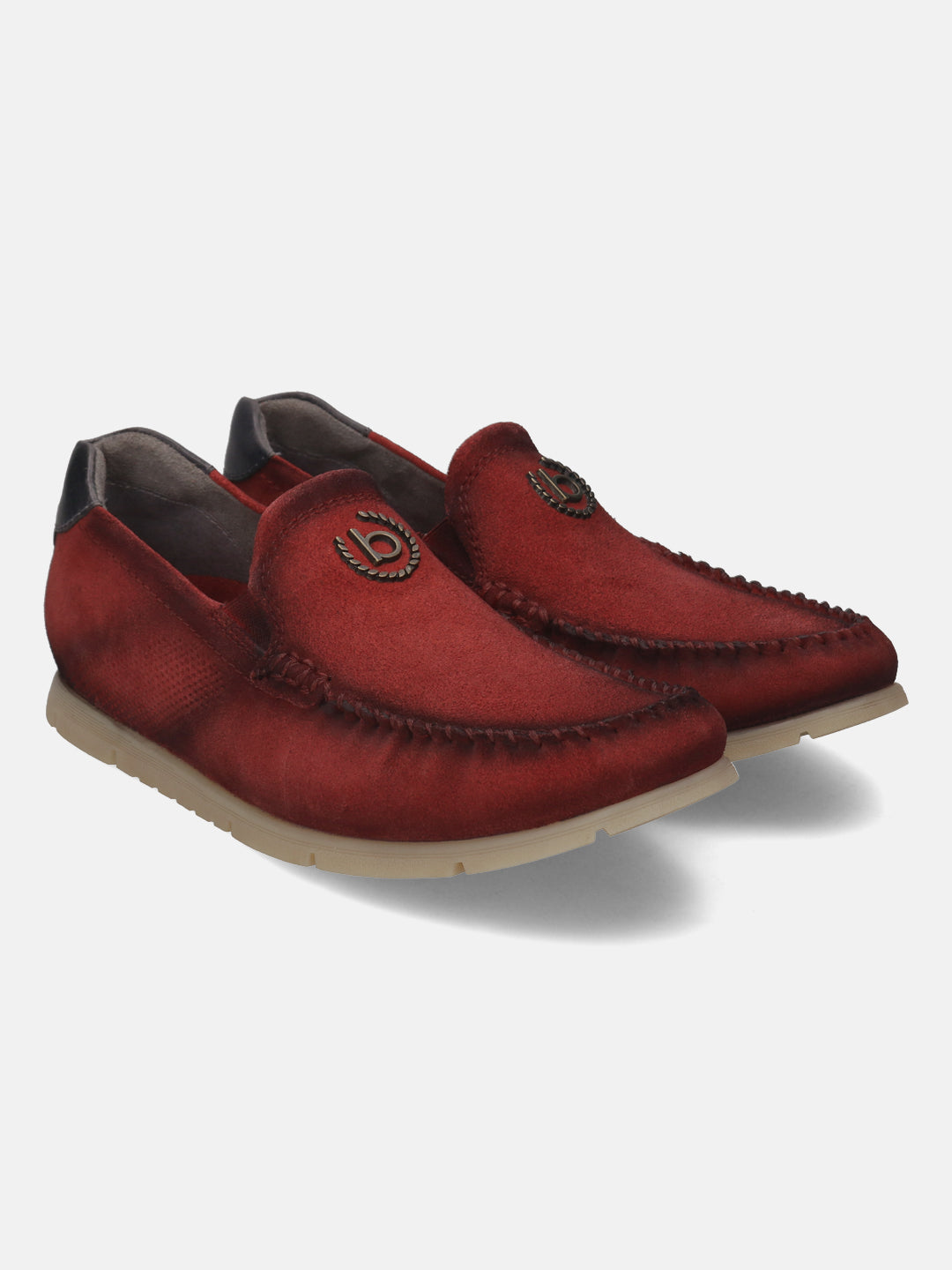 Red leather comfort slip-ons by bugatti with dark stitching and metallic logo detail.