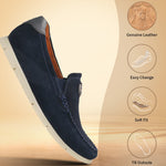 Dark blue leather comfort slip-on shoes by bugatti with a white sole and elastic side detail.