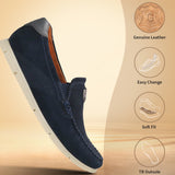 Dark blue leather comfort slip-on shoes by bugatti with a white sole and elastic side detail.