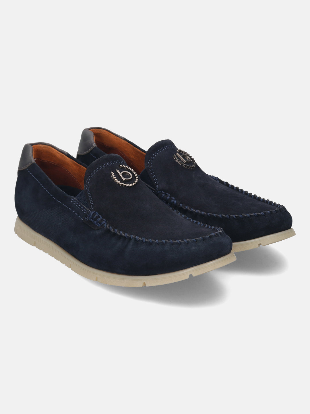 Dark blue leather slip-on shoes by bugatti, featuring a silver-toned logo emblem and contrast stitching.
