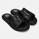 A black Men's bugatti Mules featuring a round toe plain toe, zero heels heel, and a wide fit. Made from premium genuine leather with a durable eva outsole, this slip-on design offers both style and comfort.