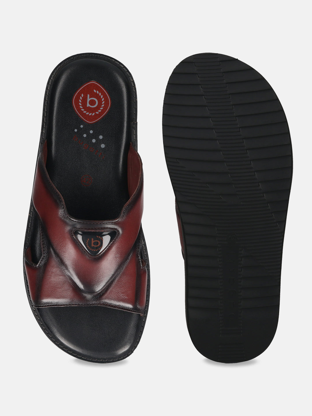 A grey Men's bugatti Mules featuring a round toe plain toe, zero heels heel, and a wide fit. Made from premium genuine leather with a durable eva outsole, this slip-on design offers both style and comfort.