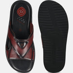 A grey Men's bugatti Mules featuring a round toe plain toe, zero heels heel, and a wide fit. Made from premium genuine leather with a durable eva outsole, this slip-on design offers both style and comfort.