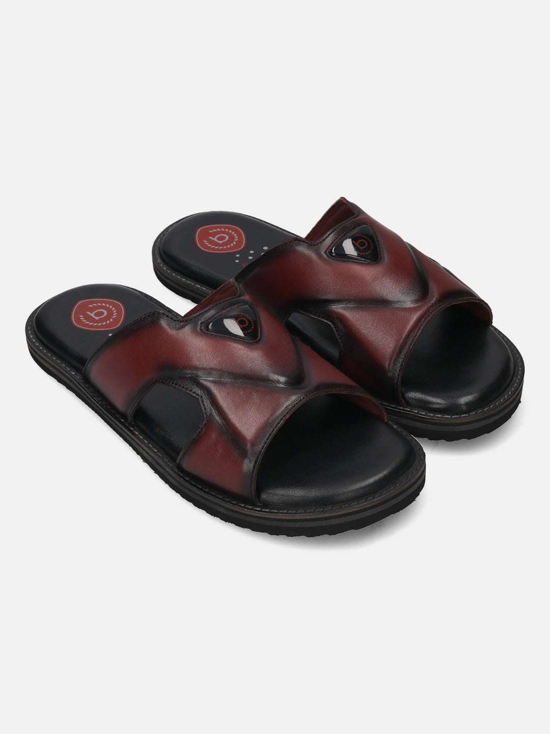 A grey Men's bugatti Mules featuring a round toe plain toe, zero heels heel, and a wide fit. Made from premium genuine leather with a durable eva outsole, this slip-on design offers both style and comfort.