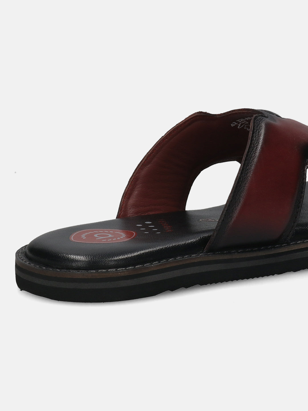 A grey Men's bugatti Mules featuring a round toe plain toe, zero heels heel, and a wide fit. Made from premium genuine leather with a durable eva outsole, this slip-on design offers both style and comfort.