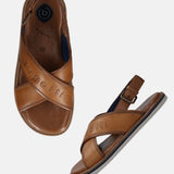 A cognac Men's bugatti Back Strap Sandals featuring a open toe plain toe, zero heels heel, and a wide fit. Made from premium genuine leather with a durable eva outsole, this buckle design offers both style and comfort.