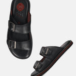 A black Men's bugatti Mules featuring a round toe plain toe, zero heels heel. Made from premium genuine leather with a durable eva outsole, this slip-on design offers both style and comfort.