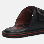 A black Men's bugatti Mules featuring a round toe plain toe, zero heels heel. Made from premium genuine leather with a durable eva outsole, this slip-on design offers both style and comfort.