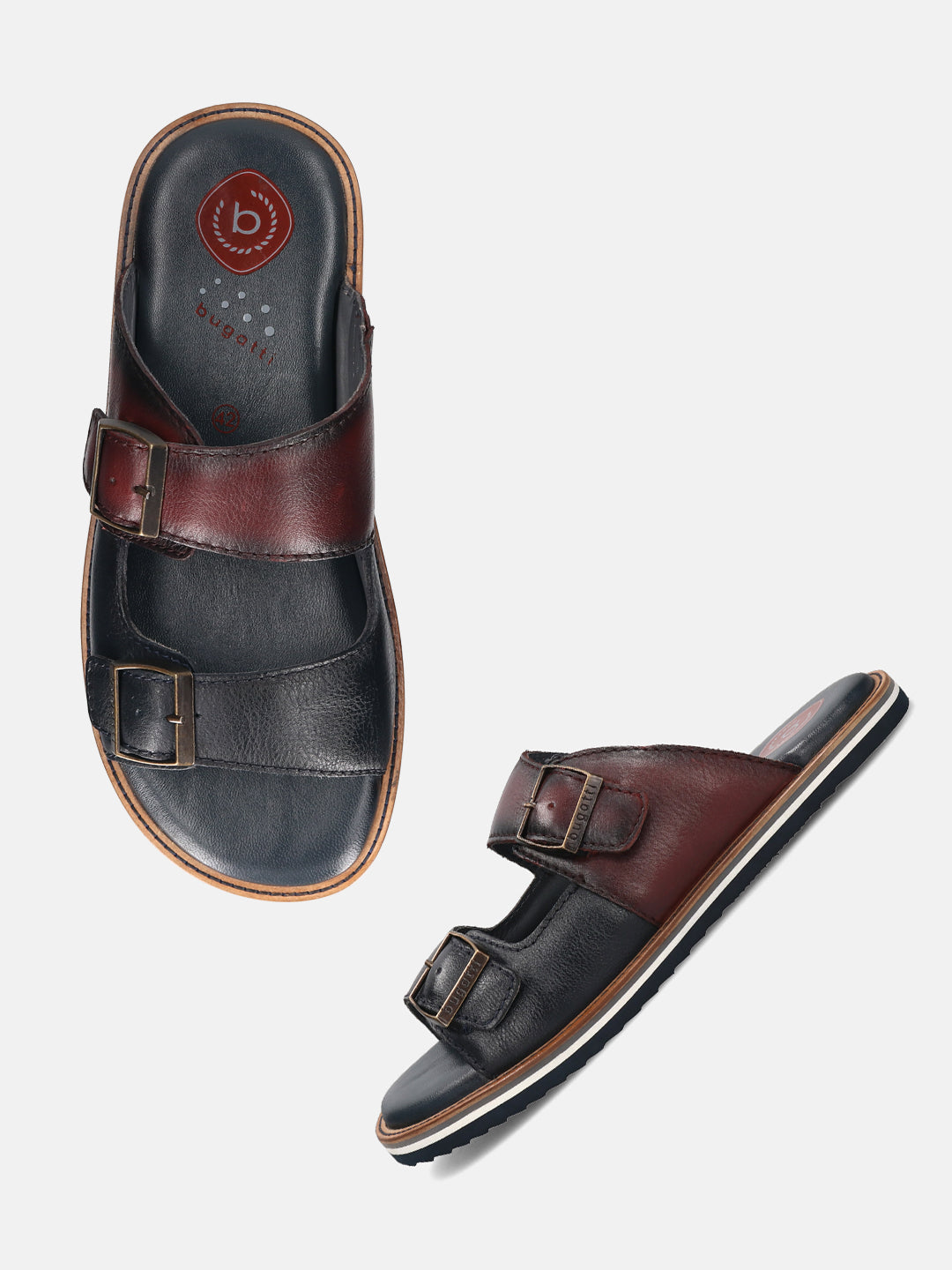 A blue Men's bugatti Mules featuring a round toe plain toe, zero heels heel. Made from premium genuine leather with a durable eva outsole, this slip-on design offers both style and comfort.