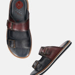A blue Men's bugatti Mules featuring a round toe plain toe, zero heels heel. Made from premium genuine leather with a durable eva outsole, this slip-on design offers both style and comfort.