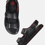 bugatti Cobie black sandals in premium leather with a comfort back strap, shown at an angle.
