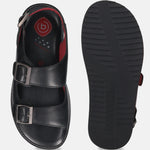 Bugatti Cobie black leather sandals with buckle straps and red lining, shown from above.