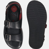 Bugatti Cobie black leather sandals with buckle straps and red lining, shown from above.