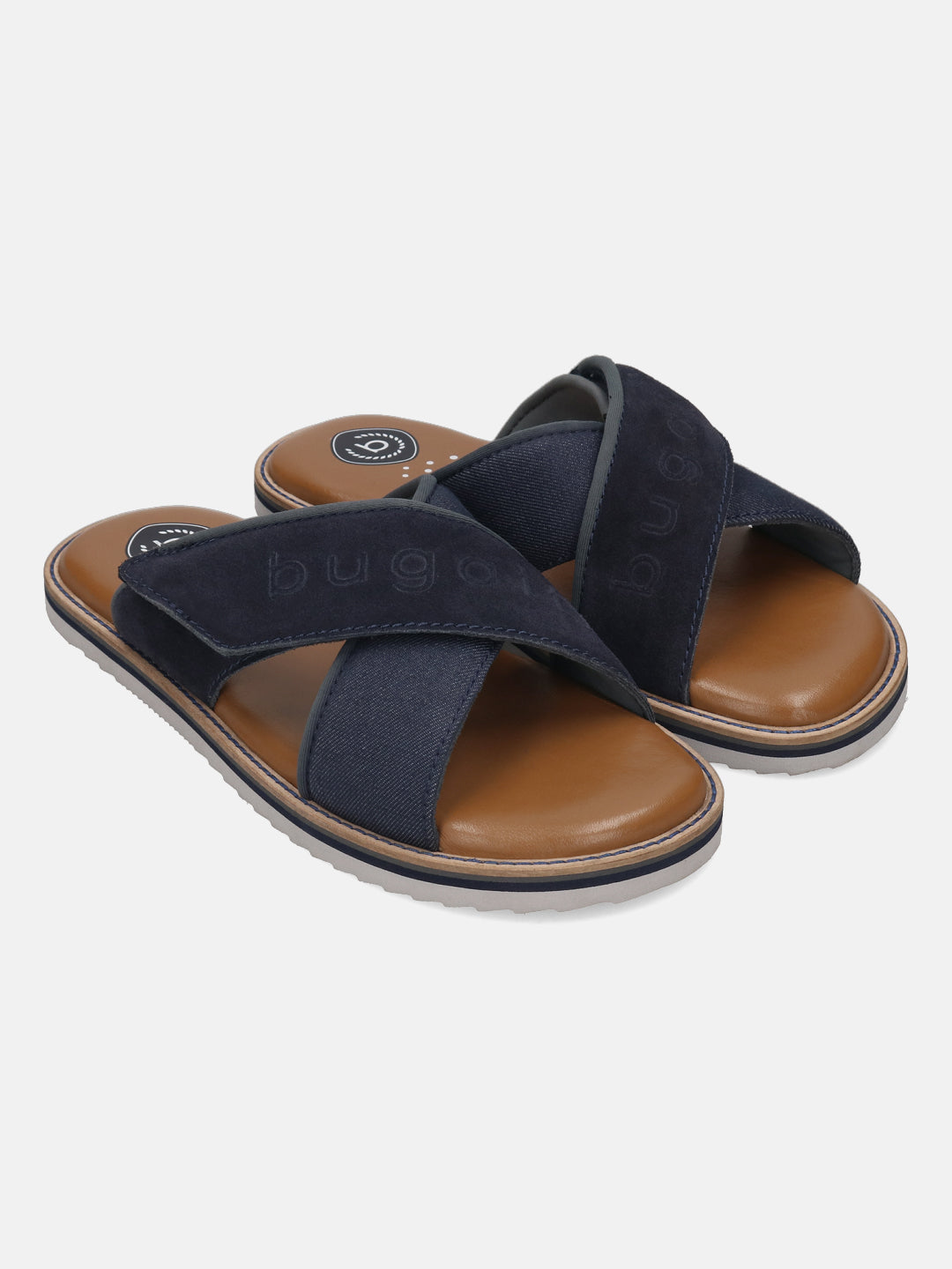 bugatti Cobie sandals in dark blue, featuring cross straps with a suede texture and a brown footbed.
