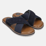 bugatti Cobie sandals in dark blue, featuring cross straps with a suede texture and a brown footbed.
