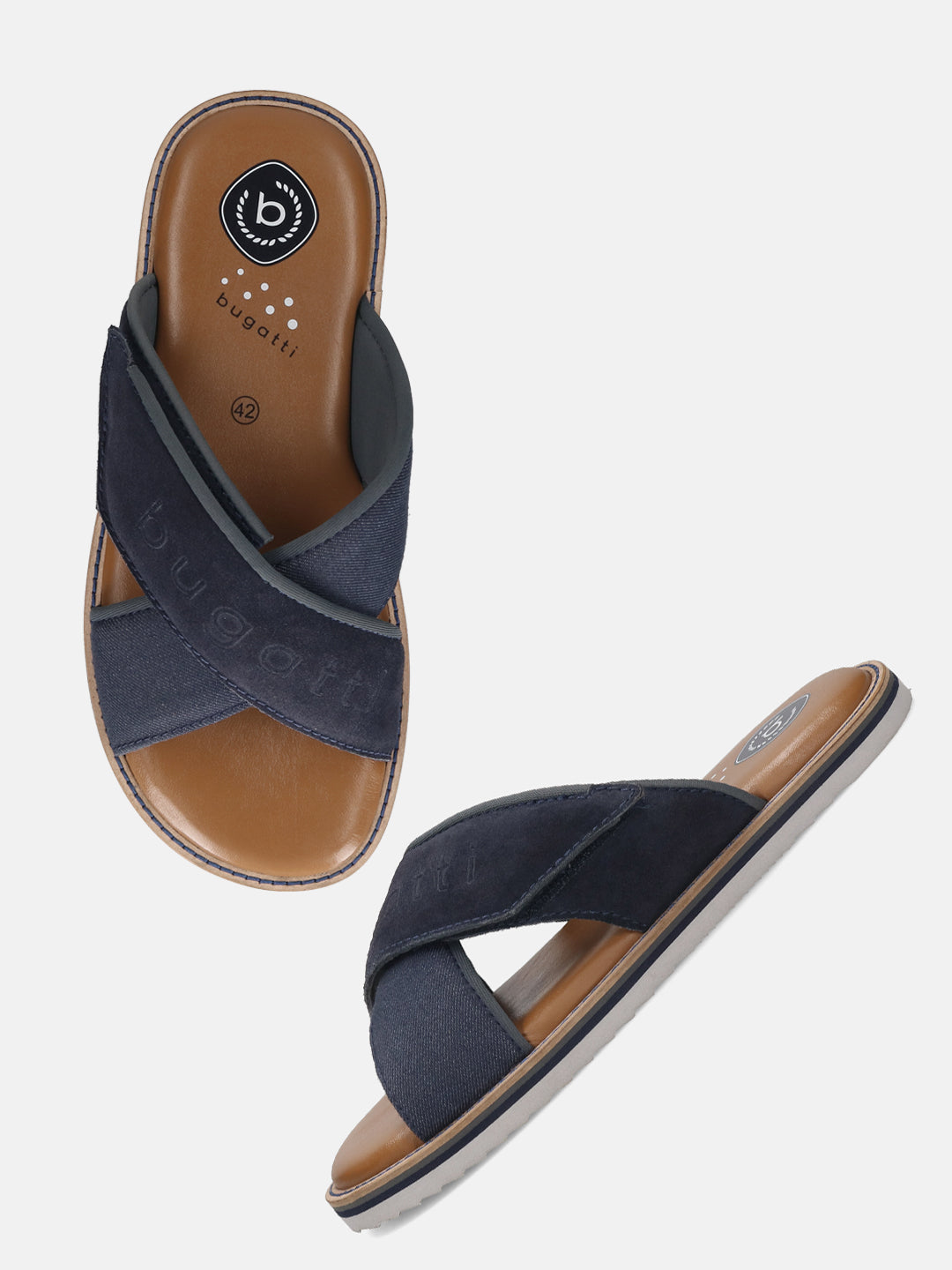 Bugatti Cobie sandals in dark blue, featuring cross straps with the brand name, a brown sole, and grey trim.
