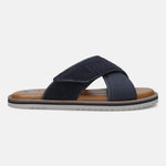 Bugatti Cobie dark blue sandals featuring cross straps in suede and denim on a brown and white sole.
