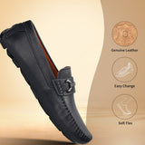 Dark blue leather slip-on shoe by bugatti with a metal accent and stitched seams.