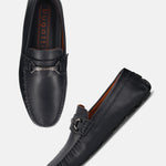 Dark blue leather slip-on shoes by bugatti with a silver-toned decorative strap.