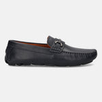 Dark blue leather loafer by bugatti with a metal accent, textured surface, and stitched detailing, in a side view.