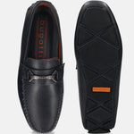 Dark blue premium leather slip-ons by bugatti, showcasing a textured upper and patterned sole.