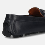 Dark blue leather slip-on shoe by bugatti, showing the heel and sole.
