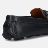 Dark blue leather slip-on shoe by bugatti, showing the heel and sole.