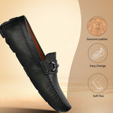 Dark green leather slip-on shoe by bugatti with textured surface and decorative metal accent.