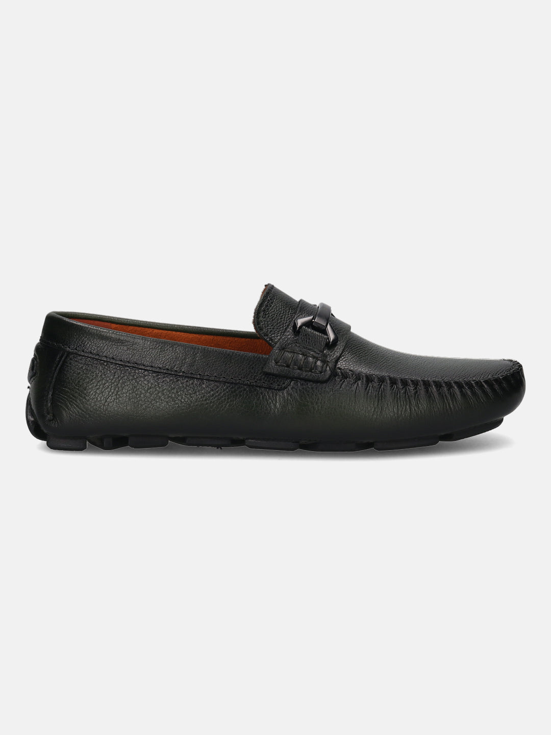 Dark green leather slip-on shoe by bugatti, featuring a metal accent and moccasin stitching detail.