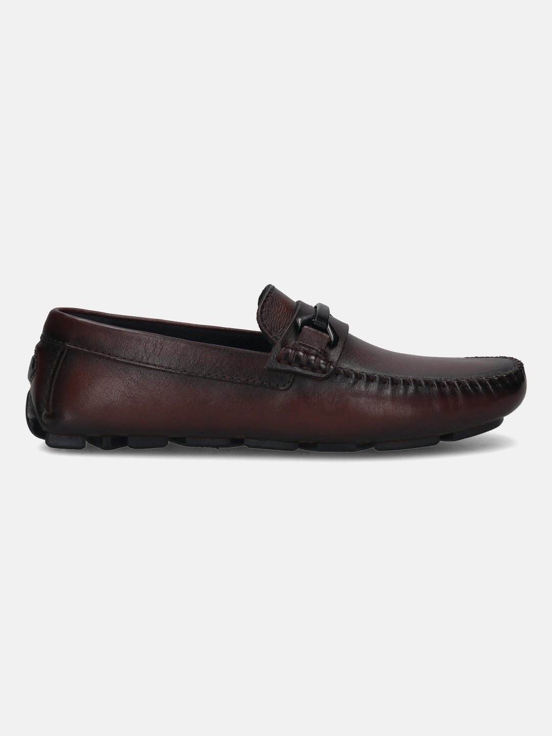 Bordeaux leather slip-on casual shoe by bugatti, featuring a metal accent piece on the upper and a textured outsole.