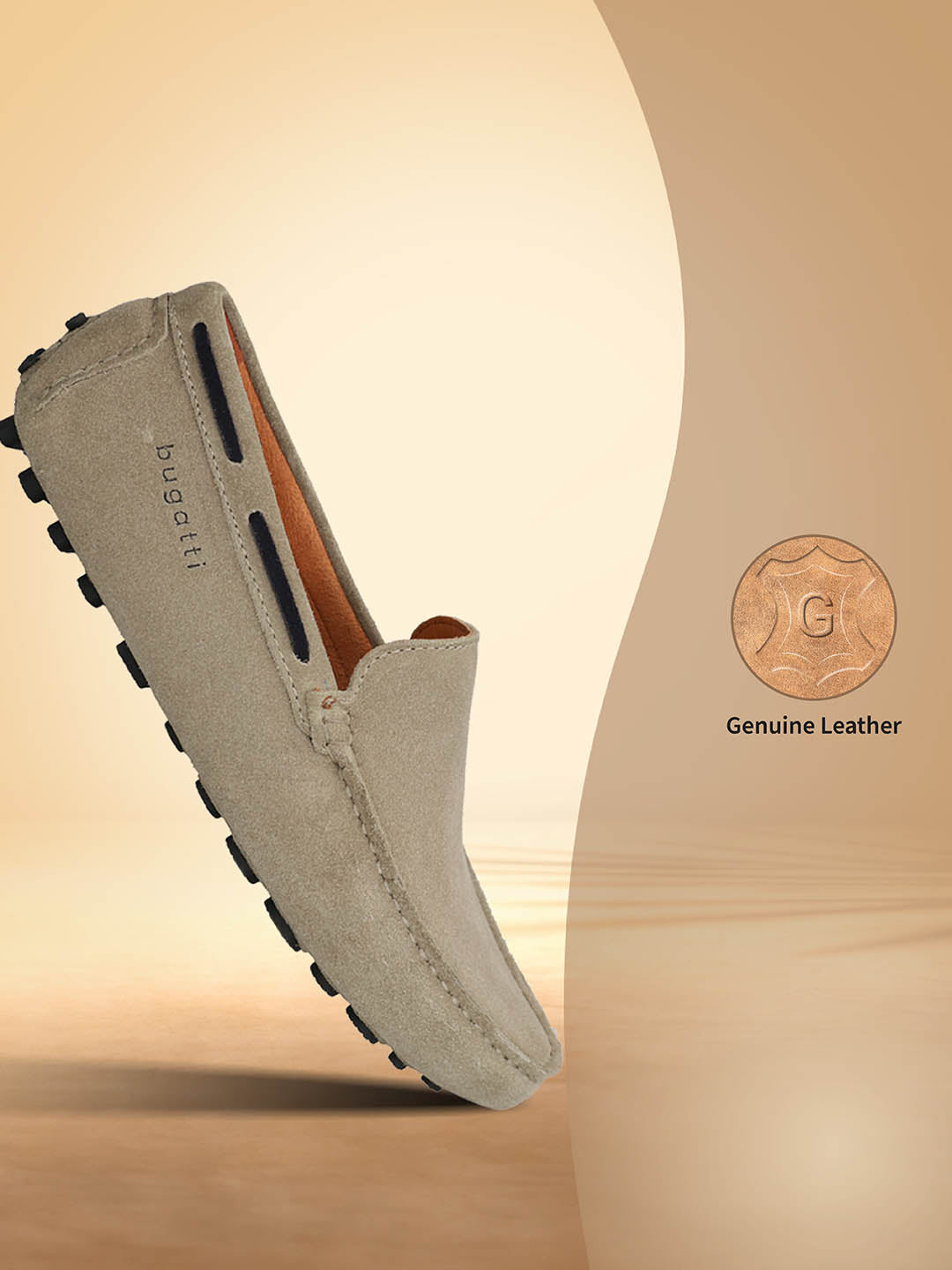 Sand-colored leather slip-on shoe by bugatti with black accent and non-slip black sole.