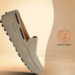 Sand-colored leather slip-on shoe by bugatti with black accent and non-slip black sole.