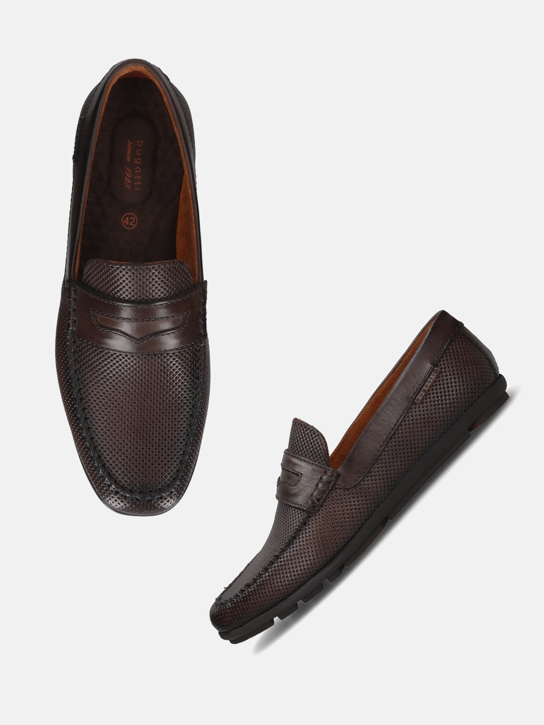 A brown Men's bugatti Drivers featuring a round toe apron toe, zero heels heel. Made from premium genuine leather with a durable rubber outsole, this slip-on design offers both style and comfort.