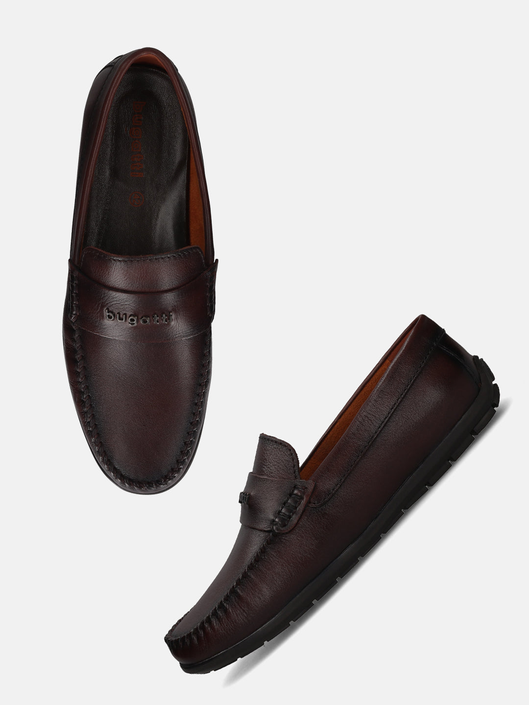 Pair of bugatti mid-brown leather slip-on casual shoes.