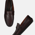 Pair of bugatti mid-brown leather slip-on casual shoes.