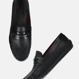 Men's Bugatti drivers black leather shoes with a round toe and apron toe , a tpr outsole.