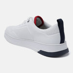 White comfort sneakers by bugatti, featuring a perforated design and dark blue accents.