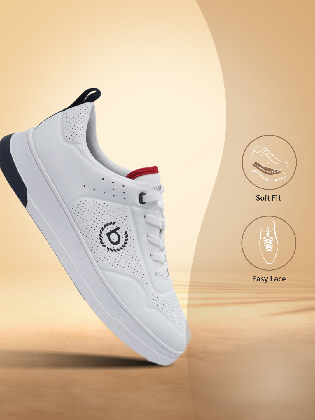 White comfort sneaker by bugatti with navy and red accents, shown at an angle on a warm-toned background.
