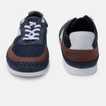 A blue Men's bugatti Sneakers featuring a round plain toe, zero heels heel. Made from synthetic with a durable tpr outsole, this laces design offers both style and comfort.