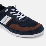 A blue Men's bugatti Sneakers featuring a round plain toe, zero heels heel. Made from synthetic with a durable tpr outsole, this laces design offers both style and comfort.