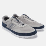 Sand low-top sneakers by Bugatti, featuring blue accents and grey laces.