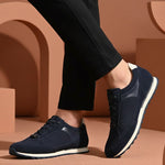 bugatti Ivar dark blue sneakers with premium leather accents, white midsoles, and dark laces.
