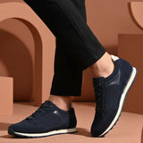 bugatti Ivar dark blue sneakers with premium leather accents, white midsoles, and dark laces.
