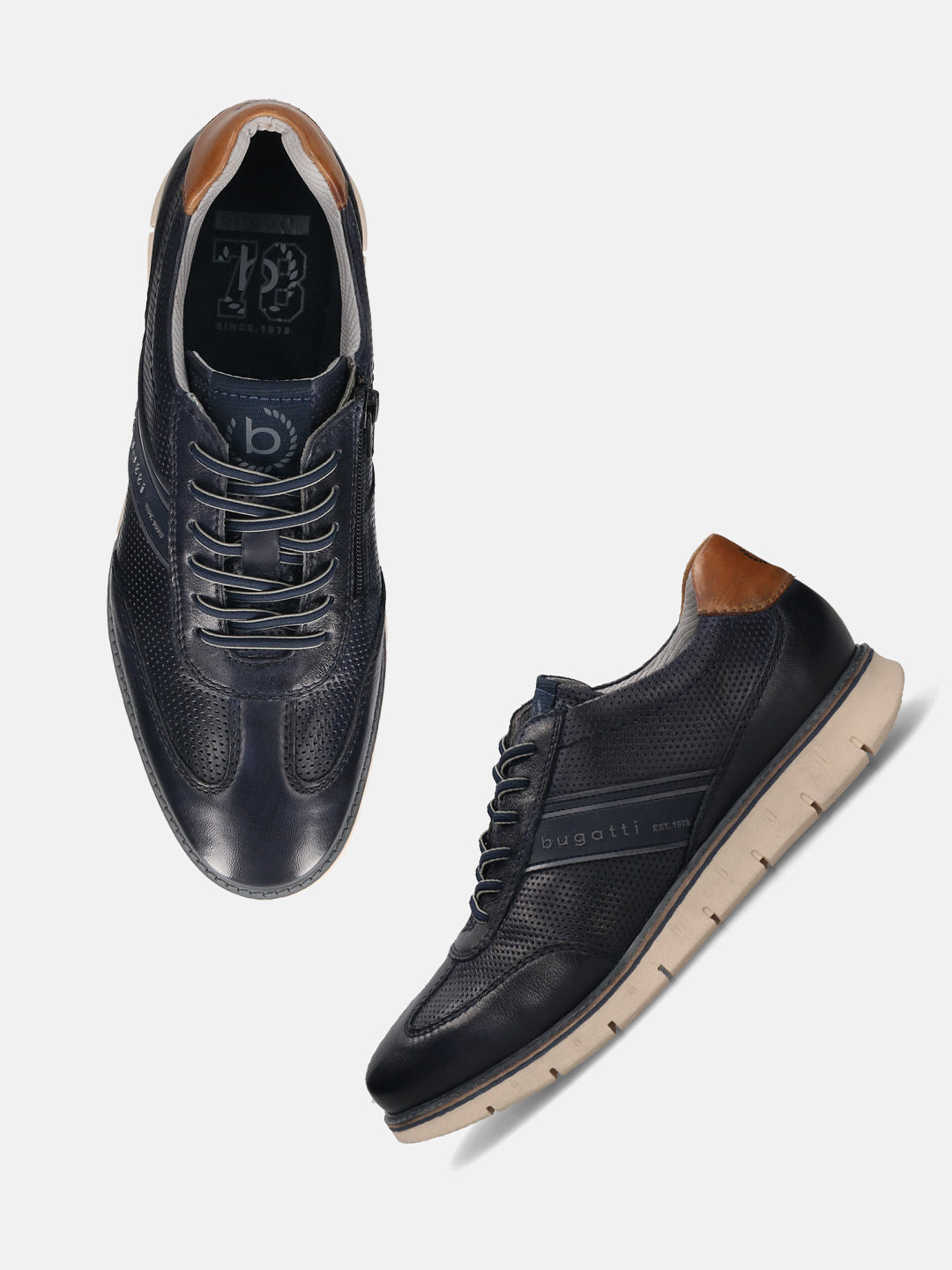 Dark blue leather comfort sneakers by bugatti, showing brown heel detail and perforated pattern on the upper.