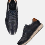 Dark blue leather comfort sneakers by bugatti, showing brown heel detail and perforated pattern on the upper.