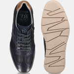 Dark blue leather sneakers by bugatti, showing laces and perforated upper, with the patterned sole.