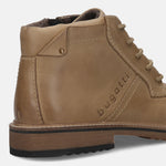 Cropped view of a sand-colored Bugatti boot in premium leather, featuring laces and a ridged sole.

