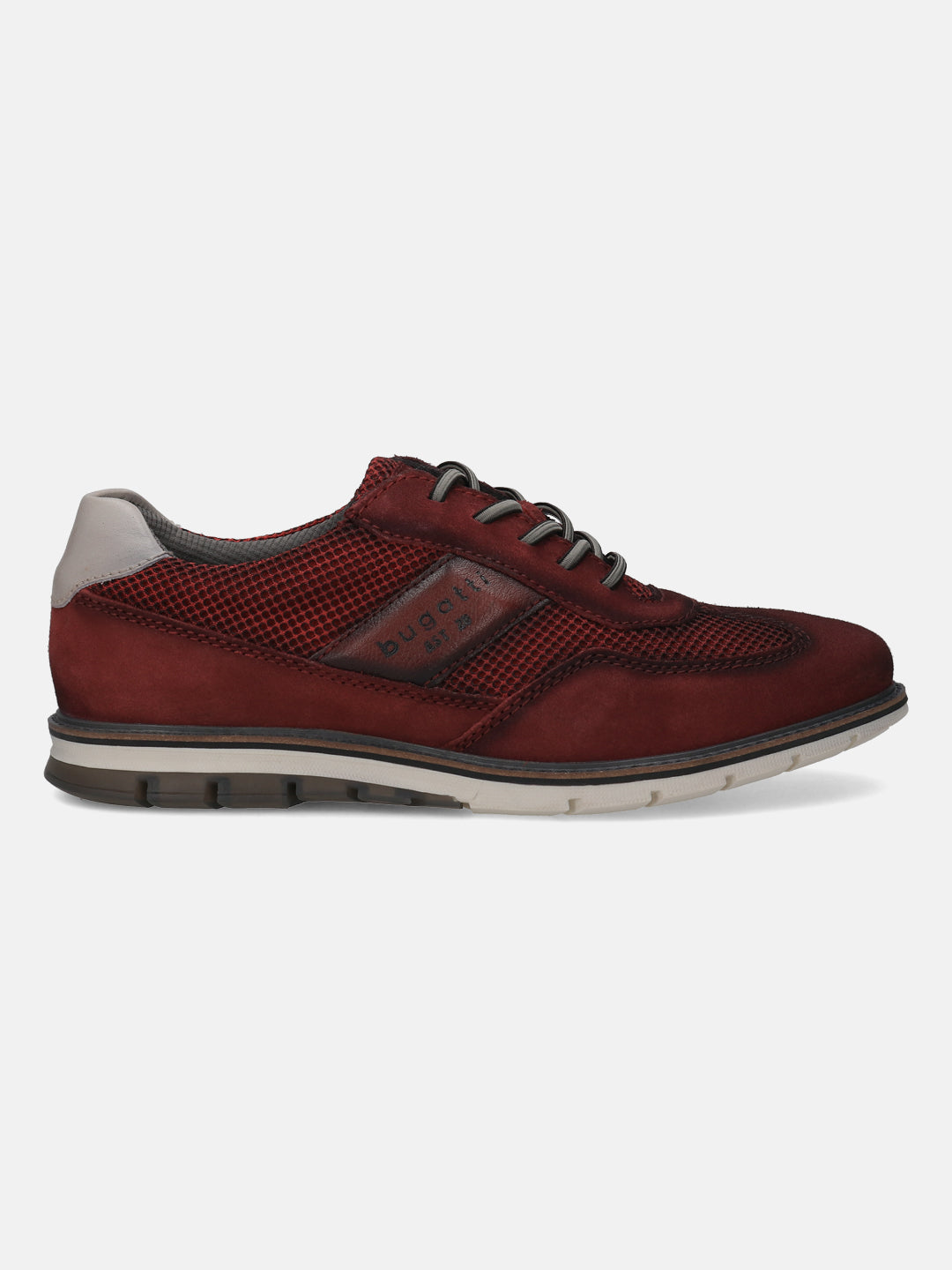 A grey Men's bugatti Casuals Shoes featuring a round toe wing tip, zero heels heel, and a wide fit. Made from premium genuine leather with a durable tr outsole, this laces design offers both style and comfort.
